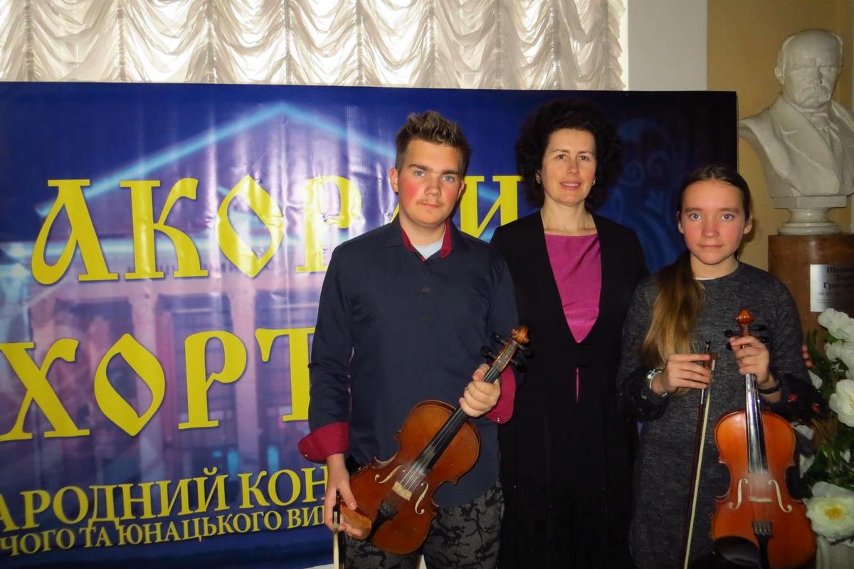 Андрей и Мария Середенко с концертмейстером А. С. Борт
