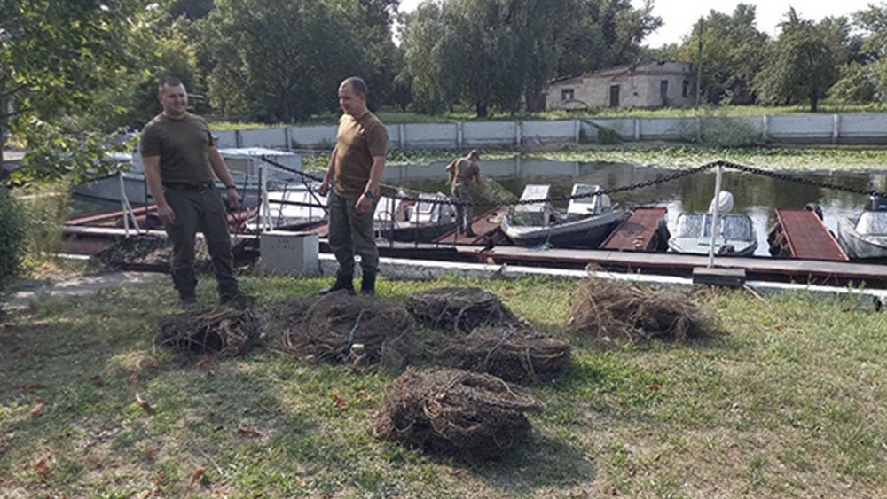 В Каховском водохранилище нашли 128 раколовок